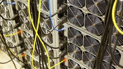 An overview of a high-efficiency mining rig setup, demonstrating cost-effective electricity management in action